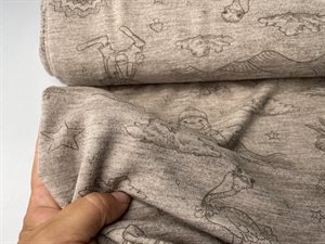 Undertøjsuld - single jersey strikket i blid nougat farvet med fint tryk
